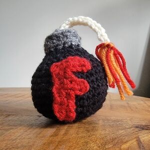 Handmade Crochet Black 'F' Bomb with Red/Orange Fuse
